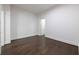 Neutral bedroom has hardwood floors, crisp white walls and bright natural light at 1065 Peachtree Ne St # 3504, Atlanta, GA 30309