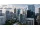 Scenic city view featuring modern skyscrapers, blue sky, and tree-lined streets at 1065 Peachtree Ne St # 3504, Atlanta, GA 30309
