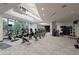 Well-equipped fitness center with cardio machines and natural light at 1065 Peachtree Ne St # 3504, Atlanta, GA 30309
