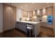 Modern eat-in kitchen with marble countertops, stainless appliances, and custom cabinetry at 1065 Peachtree Ne St # 3504, Atlanta, GA 30309