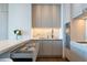 Bright kitchen with a marble backsplash, modern cabinets, and plenty of drawer space at 1065 Peachtree Ne St # 3504, Atlanta, GA 30309