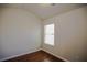 Bedroom with hardwood floors, neutral paint, and a bright window at 2304 Shetley Creek Dr, Norcross, GA 30071