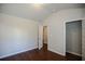 Bedroom with hardwood floors and a walk-in closet at 2304 Shetley Creek Dr, Norcross, GA 30071