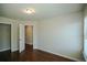 Bedroom with hardwood floors and a walk-in closet at 2304 Shetley Creek Dr, Norcross, GA 30071