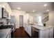 Spacious kitchen with granite countertops, stainless steel appliances, and center island at 2304 Shetley Creek Dr, Norcross, GA 30071