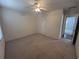 Bedroom with ceiling fan and view of another bedroom at 2840 Alcovy River Vw, Dacula, GA 30019