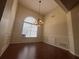 Dining area featuring a chandelier, wainscoting, and natural light at 2840 Alcovy River Vw, Dacula, GA 30019
