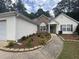 Lovely home with stone details, well-maintained lawn, and an inviting entrance at 2840 Alcovy River Vw, Dacula, GA 30019