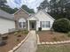 Charming home with stone accents, manicured landscaping, and a welcoming walkway at 2840 Alcovy River Vw, Dacula, GA 30019