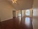 Inviting living space with hardwood floors, high ceilings, and a view of the entry at 2840 Alcovy River Vw, Dacula, GA 30019
