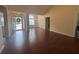 Spacious living room featuring hardwood floors, a large window, and neutral walls at 2840 Alcovy River Vw, Dacula, GA 30019