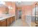 Bathroom featuring double vanity, walk-in shower, and soaking tub at 300 Towne Overlook Cir, Canton, GA 30114