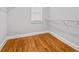Empty walk-in closet space with hardwood flooring at 300 Towne Overlook Cir, Canton, GA 30114