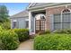 Charming entryway with a brick facade and a wooden, glass-paneled double door at 300 Towne Overlook Cir, Canton, GA 30114