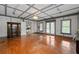 Spacious room with hardwood floors and coffered ceiling at 300 Towne Overlook Cir, Canton, GA 30114