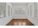Sunroom with lots of natural light featuring lots of windows and hardwood floors at 360 Ponce De Leon Ave Ne # 1, Atlanta, GA 30305