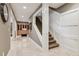 Hallway with staircase, wine cellar, and neutral tones at 3903 Hazelhurst Dr, Marietta, GA 30066