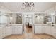 Spacious main bathroom with double sinks, tile flooring, and mirrors with views into the bedroom at 3903 Hazelhurst Dr, Marietta, GA 30066