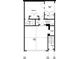 Layout featuring a 2-car garage, bathroom, bedroom, covered patio, and storage at 657 Summit Hill Way, Cumming, GA 30040