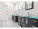 Bathroom featuring double sink vanity, tile floors, and a framed mirror at 1090 Mcdaniel St, Atlanta, GA 30310