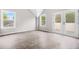 Bright bedroom features a modern window and door that leads to an outdoor space at 1090 Mcdaniel St, Atlanta, GA 30310