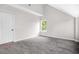 Bright bedroom with vaulted ceiling and light gray walls at 1090 Mcdaniel St, Atlanta, GA 30310