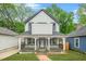 Charming two-story home with a covered front porch and fresh landscaping at 1090 Mcdaniel St, Atlanta, GA 30310