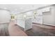 Modern kitchen featuring white cabinets and stone countertops at 1090 Mcdaniel St, Atlanta, GA 30310