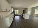Modern kitchen with white cabinets, sleek countertops, and a functional center island at 1090 Mcdaniel St, Atlanta, GA 30310