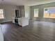 Spacious living area connected to the kitchen featuring a large center island and natural light at 1090 Mcdaniel St, Atlanta, GA 30310