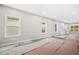 Spacious living room with freshly painted walls, wood floors and an open floor plan at 1090 Mcdaniel St, Atlanta, GA 30310
