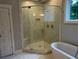 Corner glass shower in bathroom at 339 Morgan Se Pl, Atlanta, GA 30317