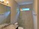 Modern bathroom features a glass shower, decorative tiling and granite countertops at 339 Morgan Se Pl, Atlanta, GA 30317
