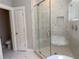 Modern bathroom with glass shower and toilet at 339 Morgan Se Pl, Atlanta, GA 30317