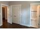 Bedroom features hardwood floors, large closet, and access to a bathroom at 339 Morgan Se Pl, Atlanta, GA 30317