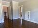 Spacious bedroom with hardwood floors, access to bathroom, and closet at 339 Morgan Se Pl, Atlanta, GA 30317