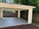This carport is attached to the house and sits behind a privacy fence at 339 Morgan Se Pl, Atlanta, GA 30317