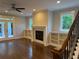 Living room featuring a fireplace and built-in bookshelves at 339 Morgan Se Pl, Atlanta, GA 30317