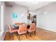 Well lit dining area features seating for six with hardwood floors and easy access to kitchen at 3445 Stratford Ne Rd # 903, Atlanta, GA 30326