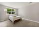 Cozy bedroom with carpet, a large window, and natural light at 4018 Dunbarton Ne Way, Roswell, GA 30075