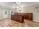 Basement with a full wet bar, perfect for entertaining, features granite counter and door to patio at 110 Wellington Way, Canton, GA 30115