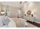 Cozy main bedroom featuring hardwood floors, neutral tones, and a relaxing atmosphere at 110 Wellington Way, Canton, GA 30115