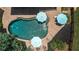 Overhead shot of outdoor pool and patio with mature landscaping around the exterior at 110 Wellington Way, Canton, GA 30115