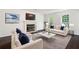 Inviting living room with fireplace, plush seating, and neutral decor at 313 Clubhouse Nw Ct, Kennesaw, GA 30144