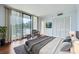 Well-furnished bedroom with hardwood floors, large windows with a view, and ample closet space at 3481 Lakeside Ne Dr # 1107, Atlanta, GA 30326