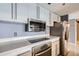 Well-equipped kitchen featuring stainless steel appliances and modern cabinetry at 3481 Lakeside Ne Dr # 1107, Atlanta, GA 30326