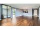 Spacious living area with hardwood floors, floor-to-ceiling sliding doors, and ample natural light at 3481 Lakeside Ne Dr # 1107, Atlanta, GA 30326