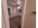 View into a bedroom with light walls, ceiling fan, and two windows at 3252 Pinehill Dr, Decatur, GA 30032