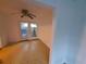 A cozy living room with fan and glass patio doors leading to the outdoor space at 3252 Pinehill Dr, Decatur, GA 30032