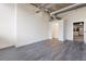 Spacious bedroom features gray flooring, closet and an open concept design at 505 Whitehall Sw St # 102, Atlanta, GA 30303